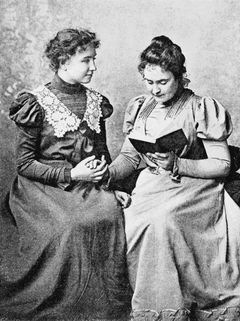 Helen Keller in 1899 with lifelong companion and teacher Anne Sullivan. Photo taken by Alexander Graham Bell at his School of Vocal Physiology and Mechanics of Speech.