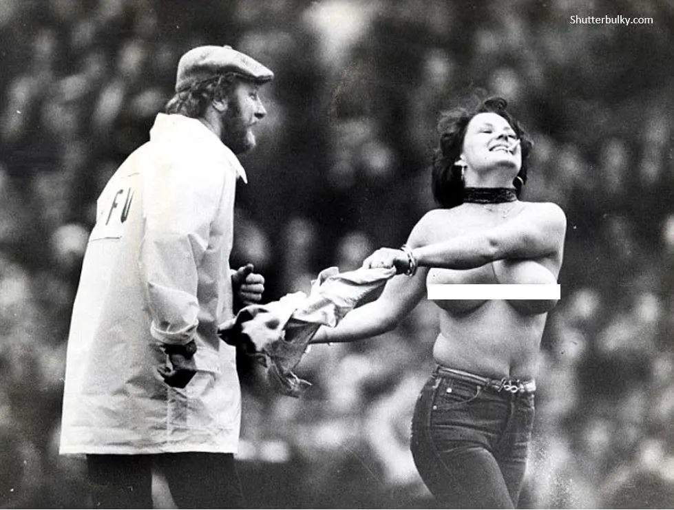 Most famous streaker Erika Roe, 24, stripped to the waist