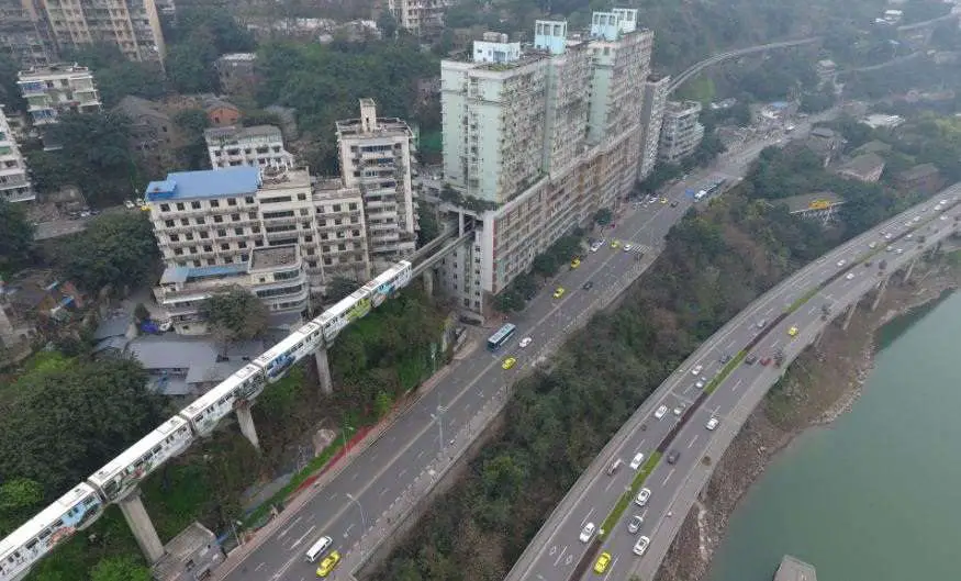 Incredible Train That Runs Between Apartment Buildings In China