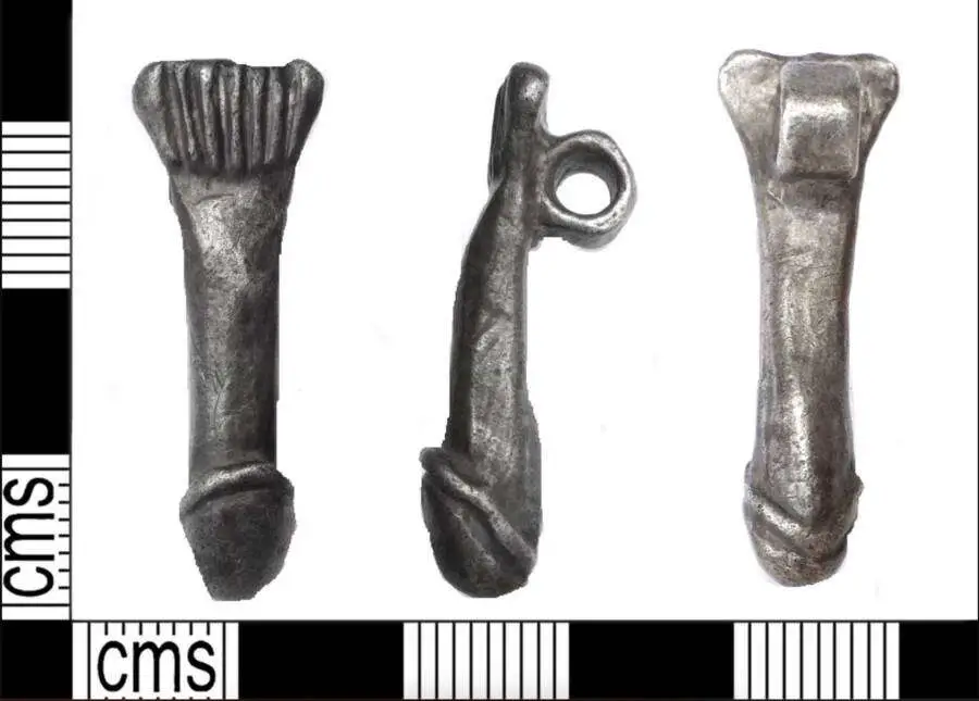 A retired metal detectorist discovers a 2,000-year-old Roman penis pendant