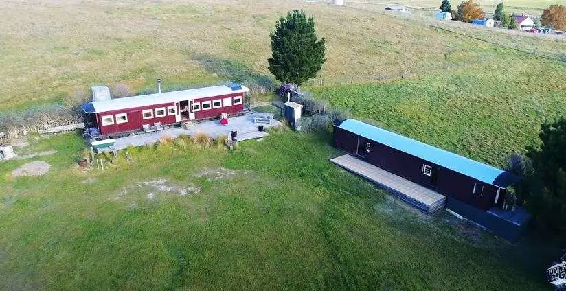A Woman Turns An Old Railroad Carriage Into A Stunning Off-Grid Tiny House | source: YouTube/Living Big In A Tiny House