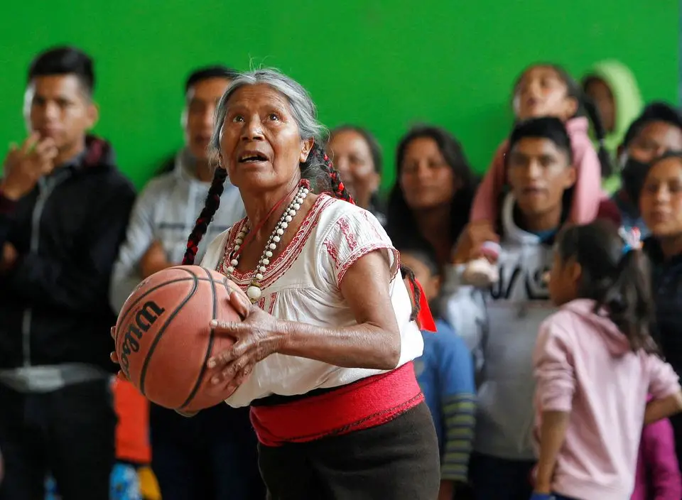 Andrea Garcia Lopez, 71, well known as “Granny Jordan” by TikTok users, is a basketball player in 2022. Plata/REUTERS
