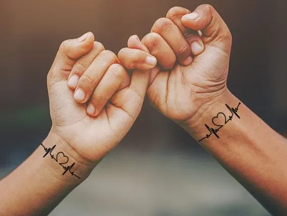 Matching Tattoos couple