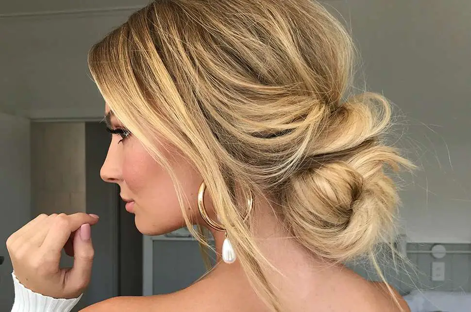 messy low bun hair style