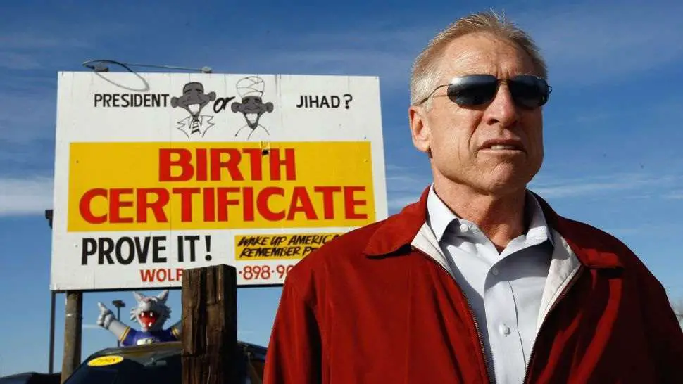 Phil Wolf, owner of a used car dealership, paid $2,500 to have this “birther” billboard painted, shown here on Nov. 21, 2009 in Wheat Ridge, Colorado. (Image credit: John Moore/Getty Images)